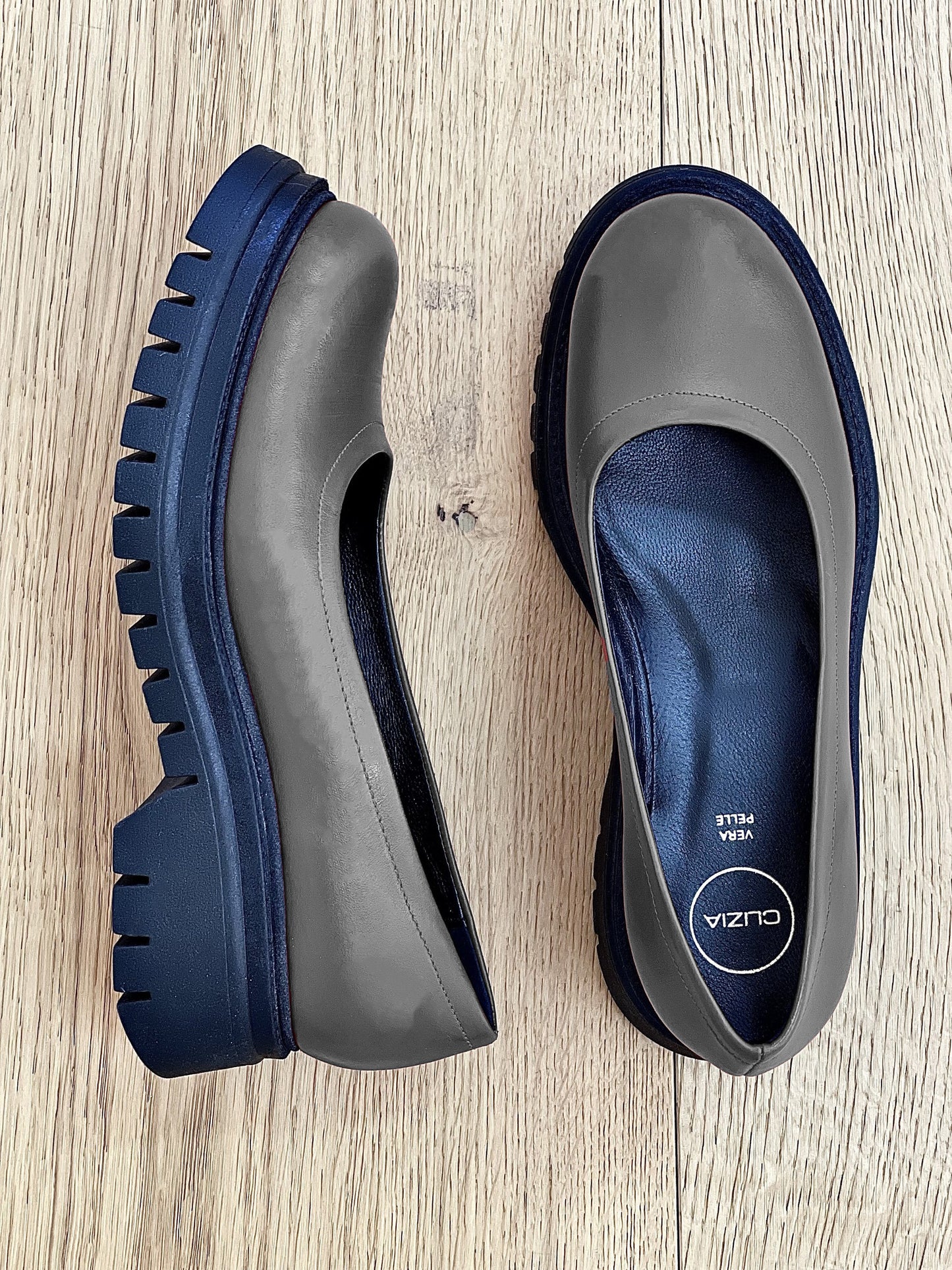 BERNSTEINFARBENES LEDER GRAU