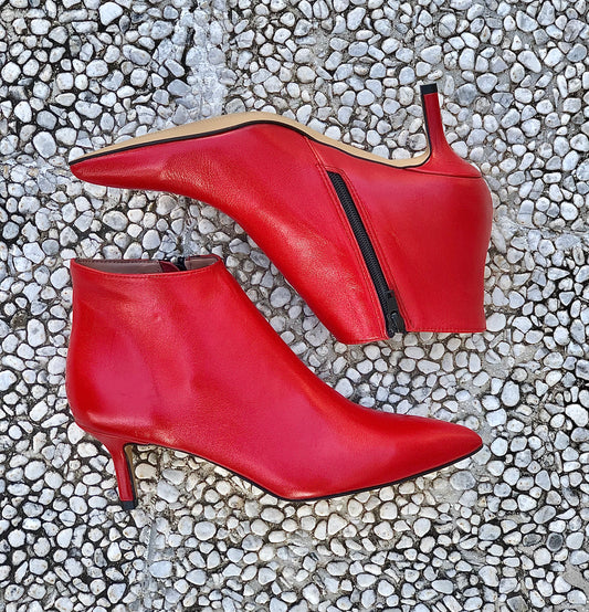 TETAS DE CUERO ROJO